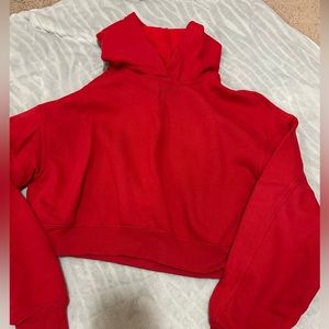 Red slightly cropped hoodie , soft and fitting